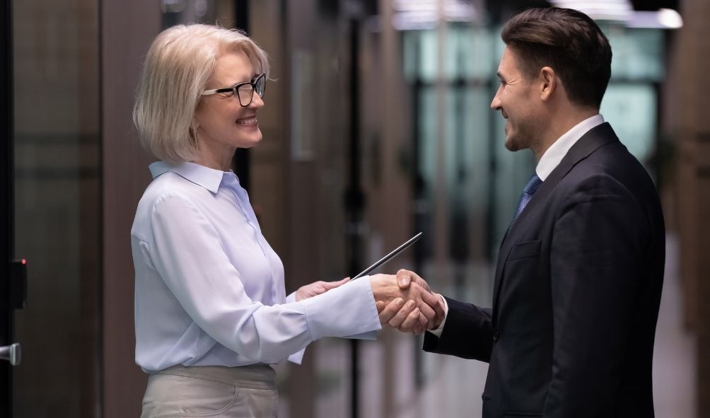 woman shaking hands